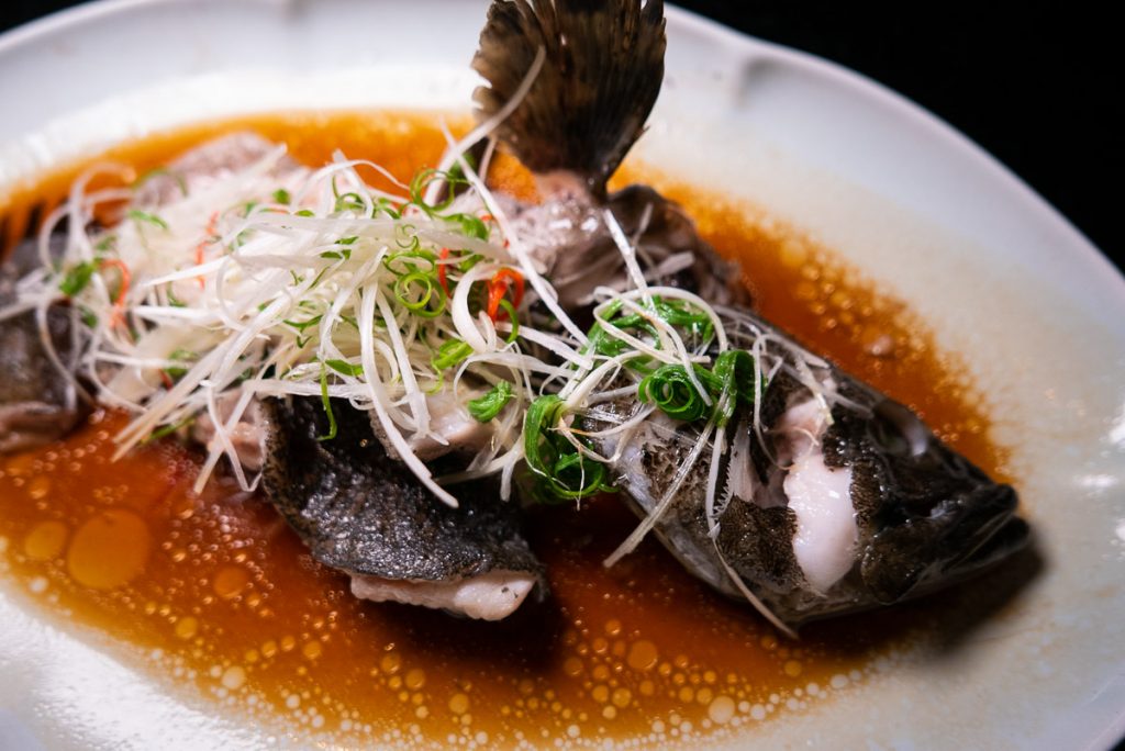 Steamed Grouper on the Chinese New Year Menu at Hakkasan Shanghai. Photo by Rachel Gouk.