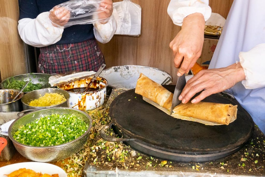 Jianbing is China's most popular breakfast street food. Taken in Shanghai. Photo by Rachel Gouk.