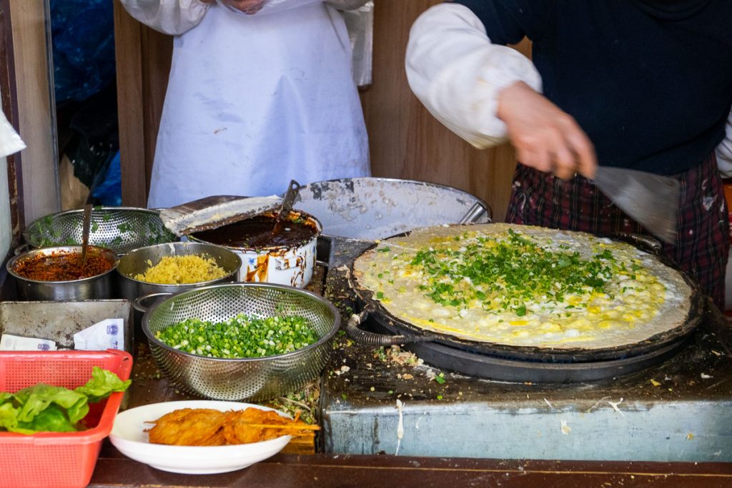 Jianbing is China's most popular breakfast street food. Taken in Shanghai. Photo by Rachel Gouk.