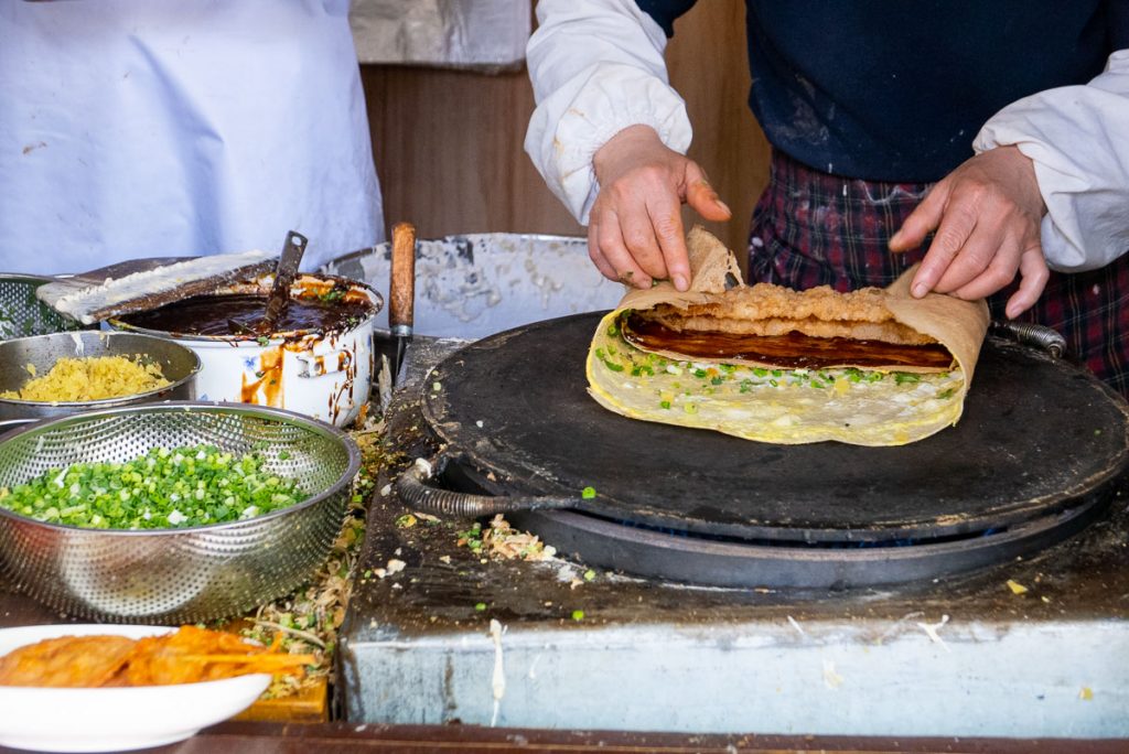 Jianbing is China's most popular breakfast street food. Taken in Shanghai. Photo by Rachel Gouk.
