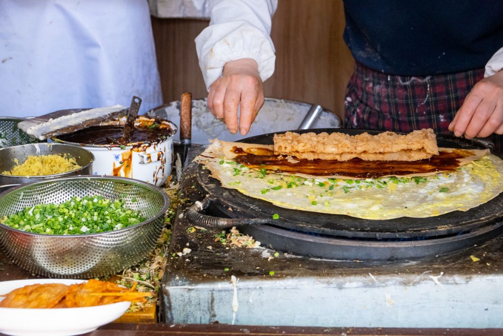 Jianbing is China's most popular breakfast street food. Taken in Shanghai. Photo by Rachel Gouk.