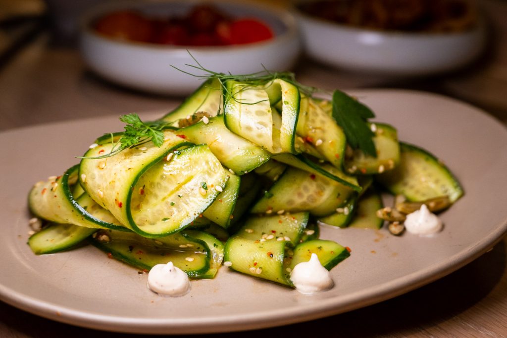 Shaved Heirloom Cucumber at Heritage by Madison, a restaurant in Shanghai by chef Austin Hu serving a seamless mix of Western and Asian influences. Photo by Rachel Gouk.