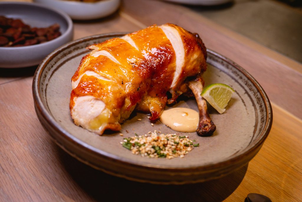 Tea Smoked San Huang Chicken Supreme at Heritage by Madison, a restaurant in Shanghai by chef Austin Hu serving a seamless mix of Western and Asian influences. Photo by Rachel Gouk.