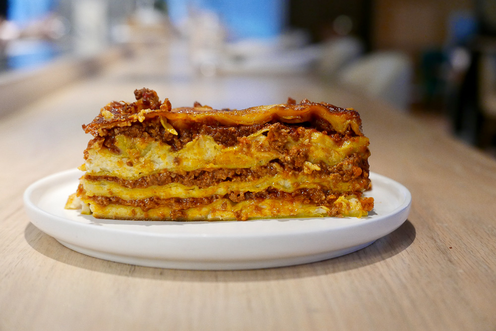 Food delivery options in Shanghai. Restaurants delivering comfort foods: Lasagna from Heritage y Madison. Photo by Rachel Gouk @ Nomfluence.
