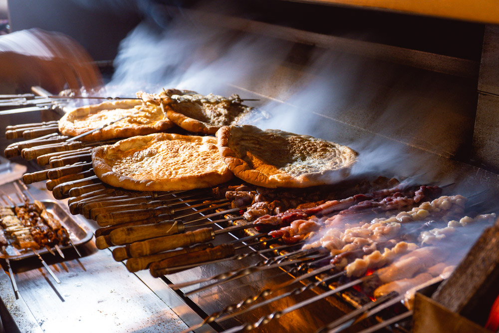 Street food in Shanghai at Xinjiang Ali Barbecue. Lamb skewers for late night eats. Photo by Rachel Gouk @ Nomfluence
