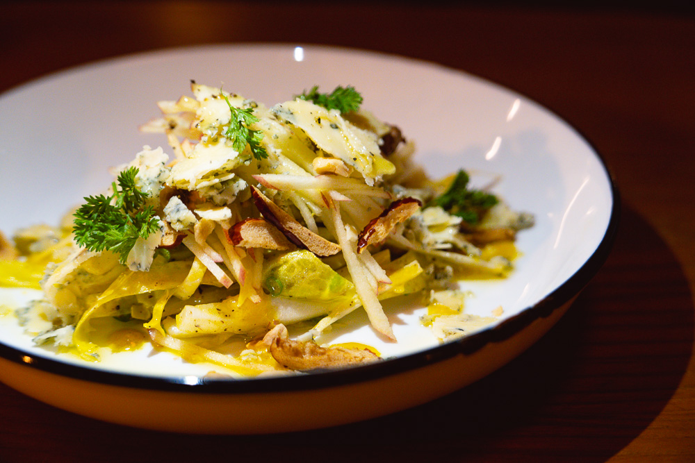 Endive salad at SOiF, a natural wine bar in Shanghai that serves French and European-influenced bites. Photo by Rachel Gouk @ Nomfluence.