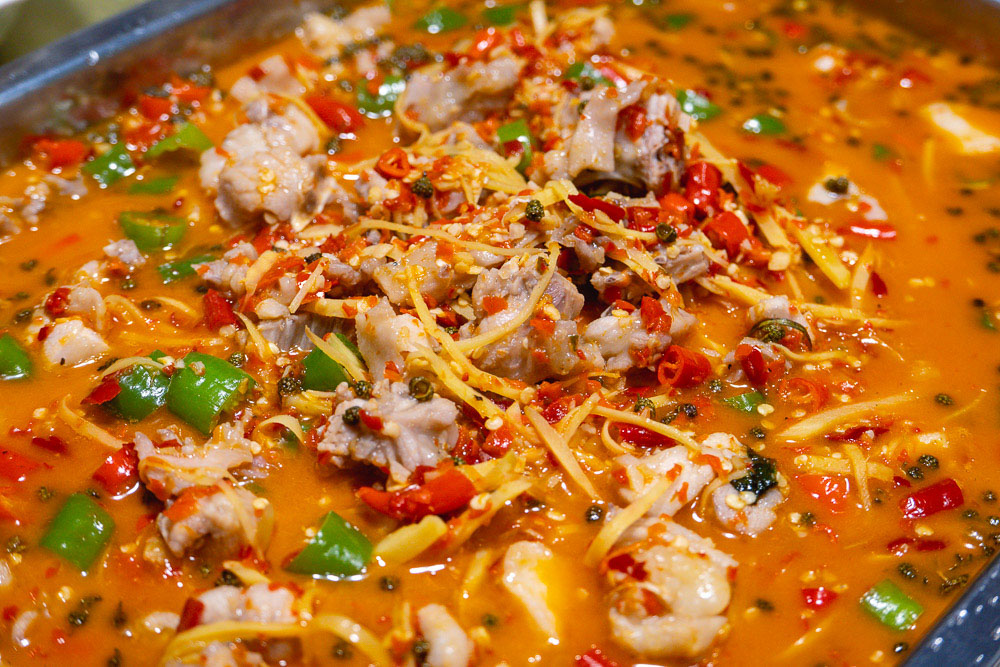 Xian Guo Tu, whole rabbit in a spicy chili ginger base. La Wei Xian 辣味鲜, a private kitchen serving authentic Sichuan food in Shanghai. Photo by Rachel Gouk @ Nomfluence.