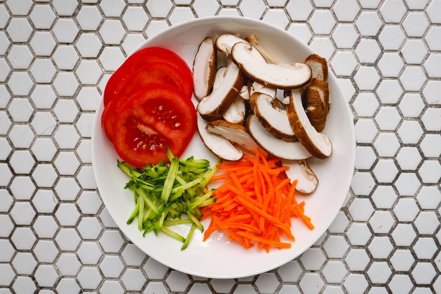Fully loaded plant-based sandwich for vegans. Easy recipes with plant-based egg alternative JUST Egg. Photos by Rachel Gouk @ Nomfluence.