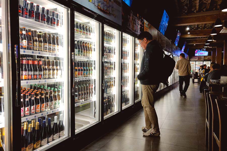 Beer Lady, Shanghai's Biggest Beer Market, Beermart. Photo by Rachel Gouk @ Nomfluence.
