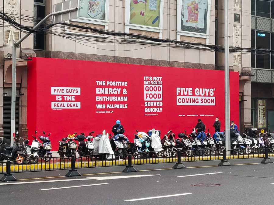 Famed US burger chain Five Guys opens in Shanghai on Shaanxi Lu and Huaihai Zhong Lu. April 2021. Photo by Rachel Gouk @ Nomfluence.