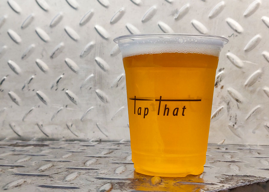 Huangpu Jiang beer. Tap That is a local chain of craft beer bars in Shanghai, serving cheap tap beer from pared-down streetside bars.