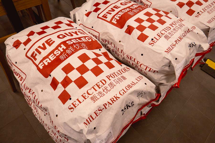 World famous burger chain Five Guys opens its first location in Shanghai, China. Photo by Rachel Gouk @ Nomfluence.