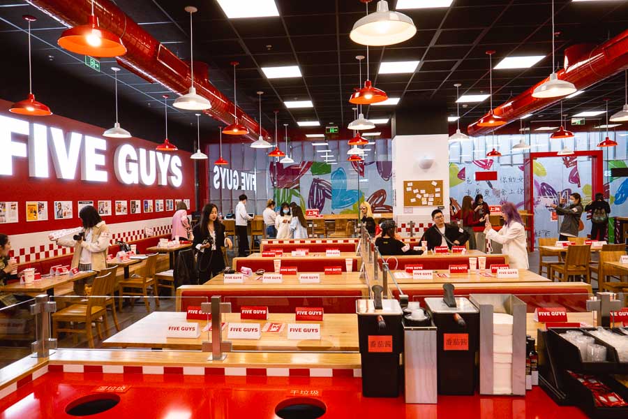 World famous burger chain Five Guys opens its first location in Shanghai, China. Photo by Rachel Gouk @ Nomfluence.