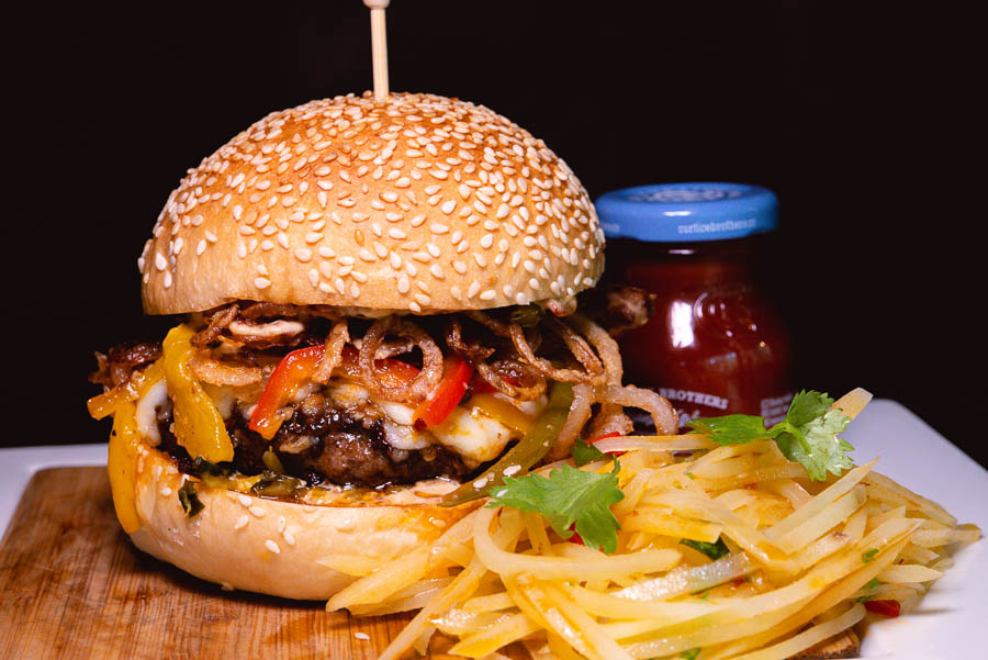 Spicy Godmother laoganma burger at Liquid Laundry. Shanghai Burger Month 2021 is a moth dedicated to the love of burgers, brought to you by food & drink blog Nomfluence.