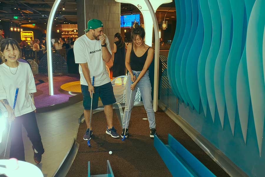 Lounge by Topgolf is a sports entertainment destination in Shanghai that has mini golf and digitized games, and a restaurant and bar.