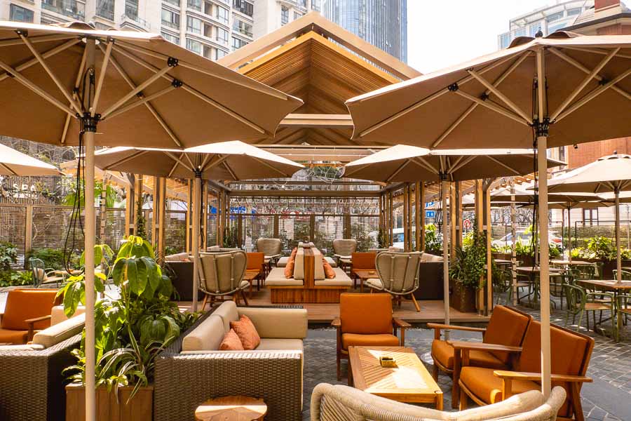 Outdoor Thai-style garden terrace at The Sukhothai Shanghai. Terrace happy hours in Shanghai @ Nomfluence