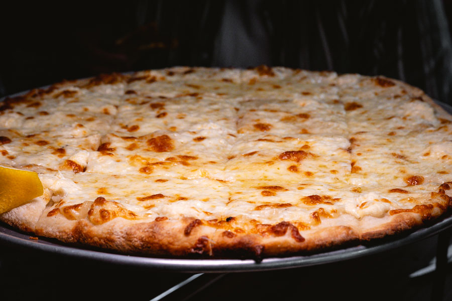 ZUP Pizza Bar is a restaurant and bar in Shanghai that does Chicago-style thin crust tavern pizzas. Photo by Rachel Gouk @ Nomfluence.