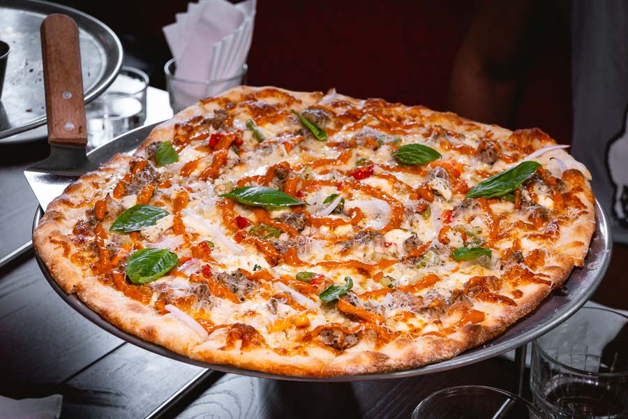 ZUP Pizza Bar is a restaurant and bar in Shanghai that does Chicago-style thin crust tavern pizzas. Photo by Rachel Gouk @ Nomfluence.