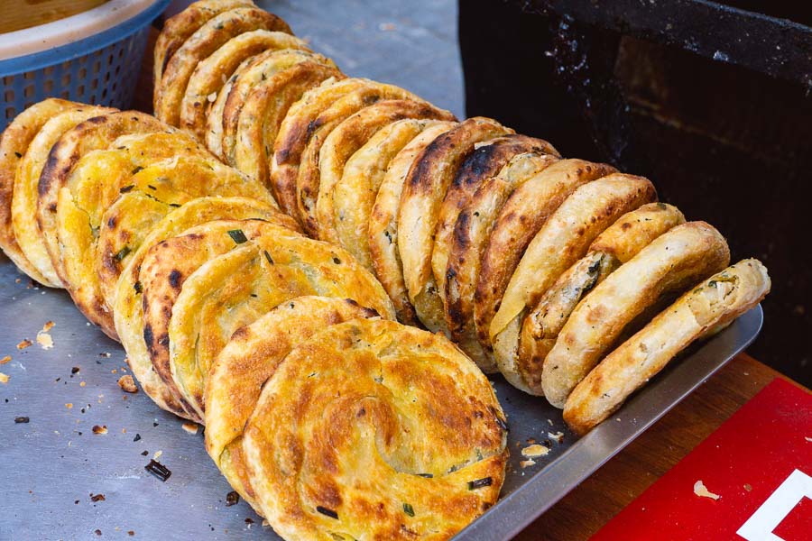 The Best Scallion Pancakes (Cong You Bing 葱油饼) in Shanghai. Photo by Rachel Gouk @ Nomfluence.