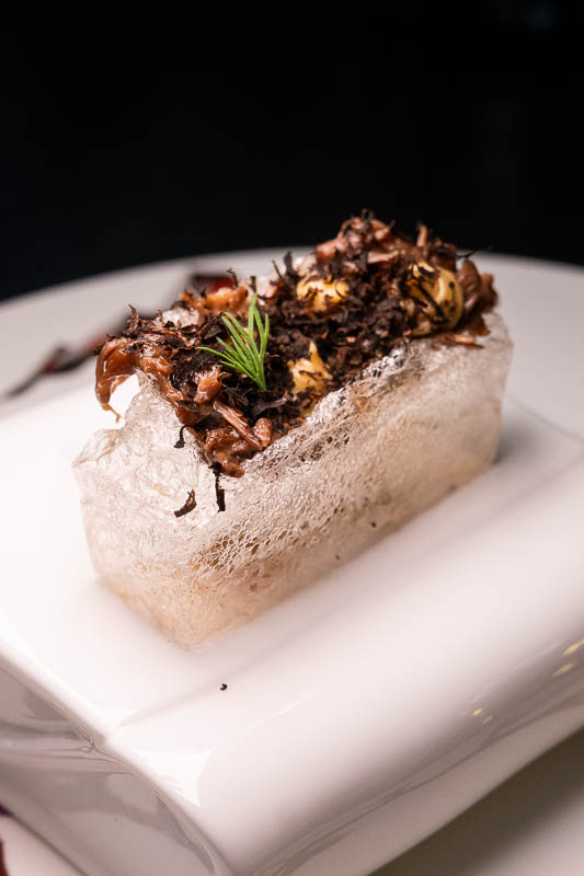 Nebula Shanghai is a Spanish fine dining restaurant serving a menu with global influences and molecular cuisine techniques.